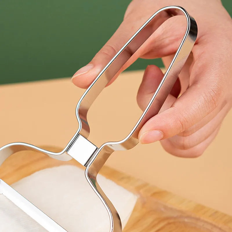 Descasque e fatie com zero esforço: o cortador de aço inox que deixa suas receitas prontas em segundos, com precisão profissional.